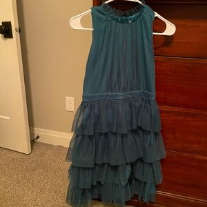 Hannah Banana deep green dress. Perfect for your holiday season!